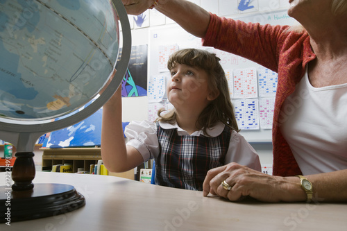 Photo: Little Girl Learning Geography Little Girl Learning Geography