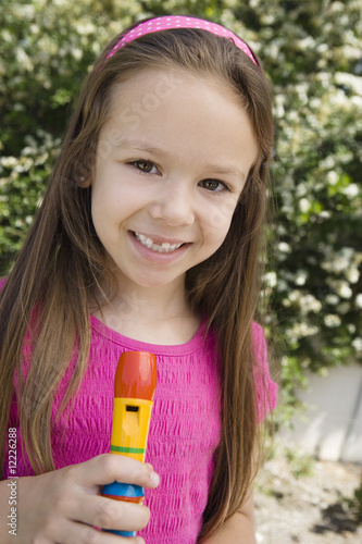 Photo: Little Girl with a Recorder Little Girl with a Recorder