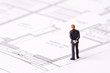 businessman examining a blueprint