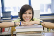 High School Student with a Stack of Books