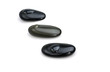 Dark pebble stones with water drops on white