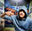 Cool looking hooligan in a graffiti painted gateway Cool looking hooligan in a graffiti painted gateway