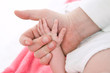 father's and baby's hands