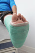 Detail of boy's leg in plaster cast