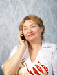 The mature woman with phone
