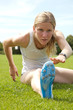 Sportlerin beim Stretching