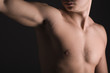 Young Sporty Man over Black Background, Body Parts