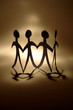 Paper-chain people holding hands
