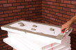 Applying adhesive to insulation polystyren