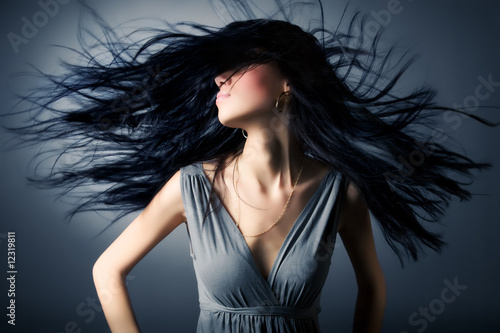 Photo: Woman with fluttering hair Woman with fluttering hair