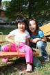 Girls on seesaw
