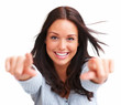 Portrait of happy young female pointing towards the camera again