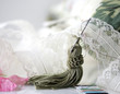 Tassel and needle