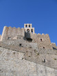 Walls of ancient castle with a bell tower Walls of ancient castle with a bell tower