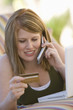 Woman Making Credit Card Purchase