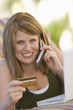 Woman Making Credit Card Purchase
