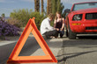 Foto: couple having car trouble couple having car trouble