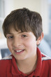 Portrait of a boy smiling.
