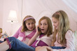 View of three surprised girls.