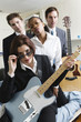 Photo: Portrait of people with guitars. Portrait of people with guitars.