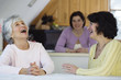 Cheerful women in a conversation.
