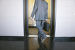 A man stepping into an elevator.
