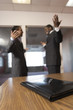 Young businessmen talking with each other.