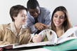 Foto: Business people flipping through pages of file in office. Business people flipping through pages of file in office.