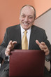 Portrait of a business man smiling.