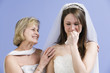 View of a mother consoling daughter.