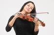 Glamorous girl playing the violin