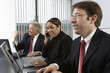 Photo: Business colleagues working in an office. Business colleagues working in an office.