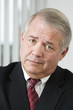 Photo: Portrait of a mature business man. Portrait of a mature business man.