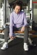 senior woman weightlifting with dumbbell