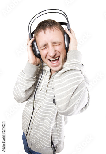 Photo: Young man listens to music Young man listens to music