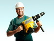 Smiled workman hold perforator over white background Smiled workman hold perforator over white background