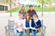 Group of young students studying