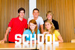 Education - Young studentgroup studying in classroom