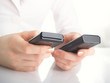 woman with mobile phones