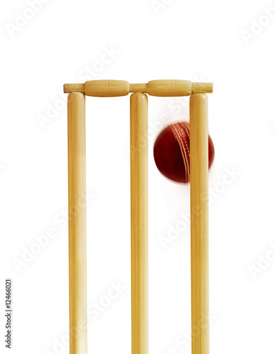 cricket bat and ball and stumps. Cricket ball hitting stumps