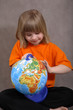 Pretty Handicapped Girl with Globe