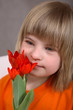 Pretty Girl with Red Tulips