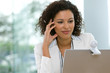 Attractive business woman working on laptop Attractive business woman working on laptop