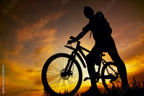Photo: silhouette of biker silhouette of biker