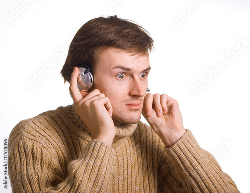Photo: young men in headphones young men in headphones