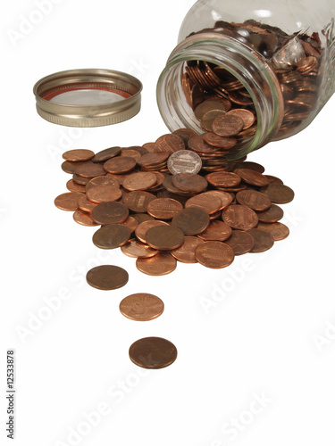 Photo: Pennies Spilling out of Mason Jar Pennies Spilling out of Mason Jar