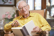 Senior man reading book