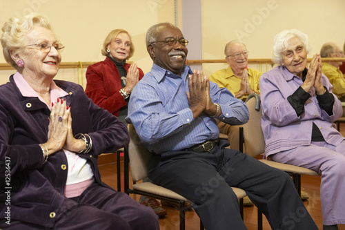 Photo: Senior adults in a stretching class Senior adults in a stretching class