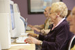Senior woman using computer