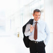 Portrait of a smiling handsome young business man